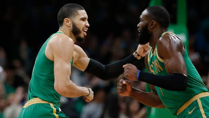 Jayson Tatum and Jaylen Brown of the Boston Celtics celebrate